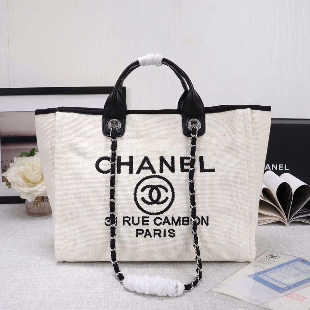 Ch*el woven straw raffia striped medium deauville tote